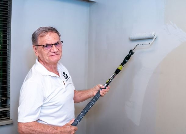 Painter with a roller